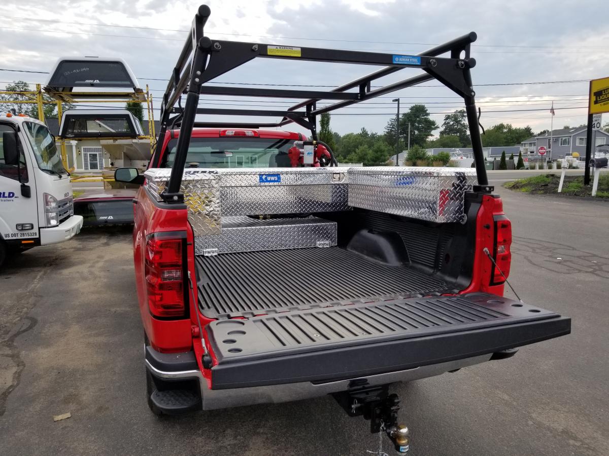 Truck bed outlet tent with toolbox